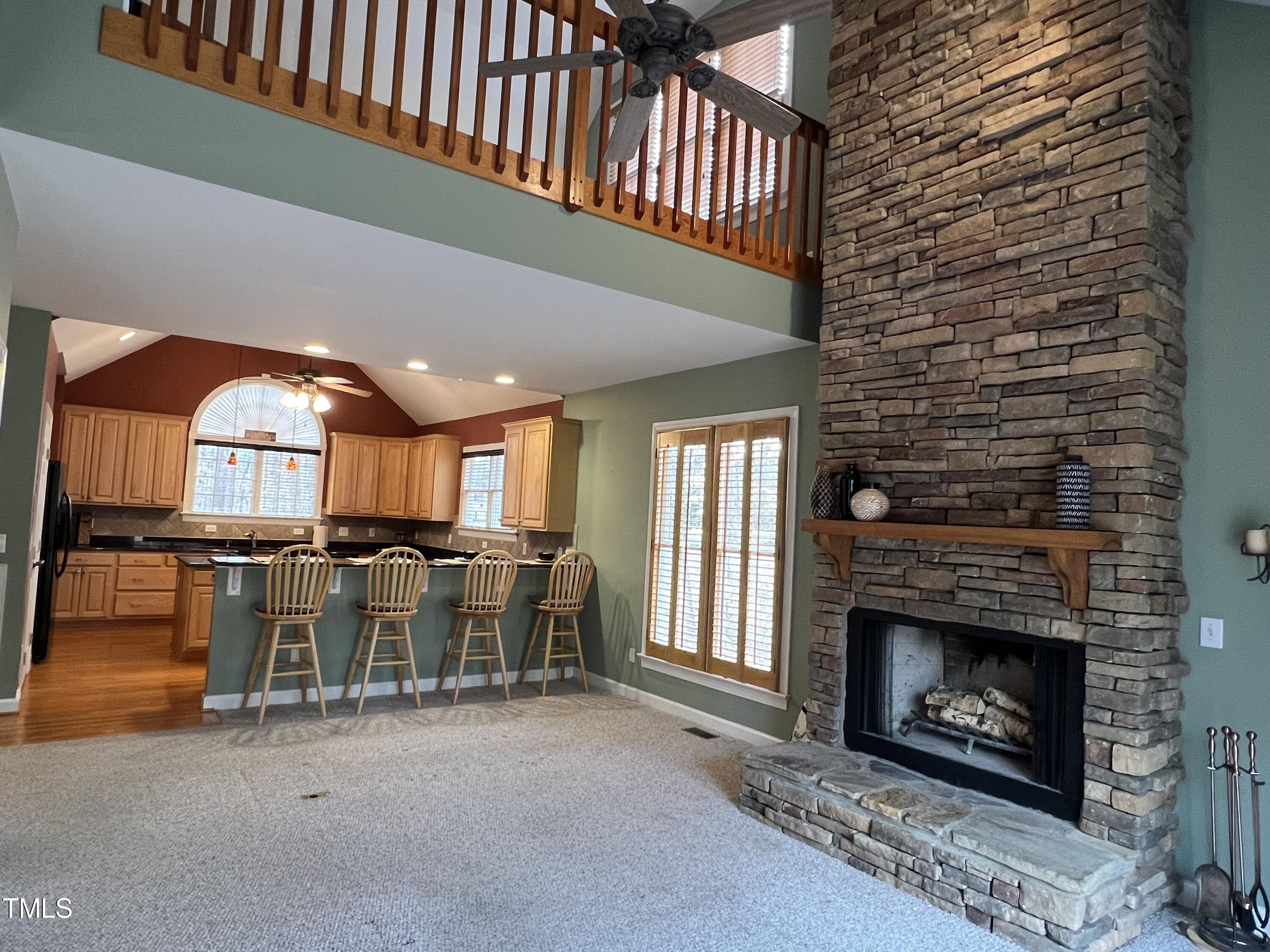 2308 Mt Vernon Church Road Raleigh, NC 27614 - Photo 7 of 59 a view of a livingroom with furniture and a fireplace