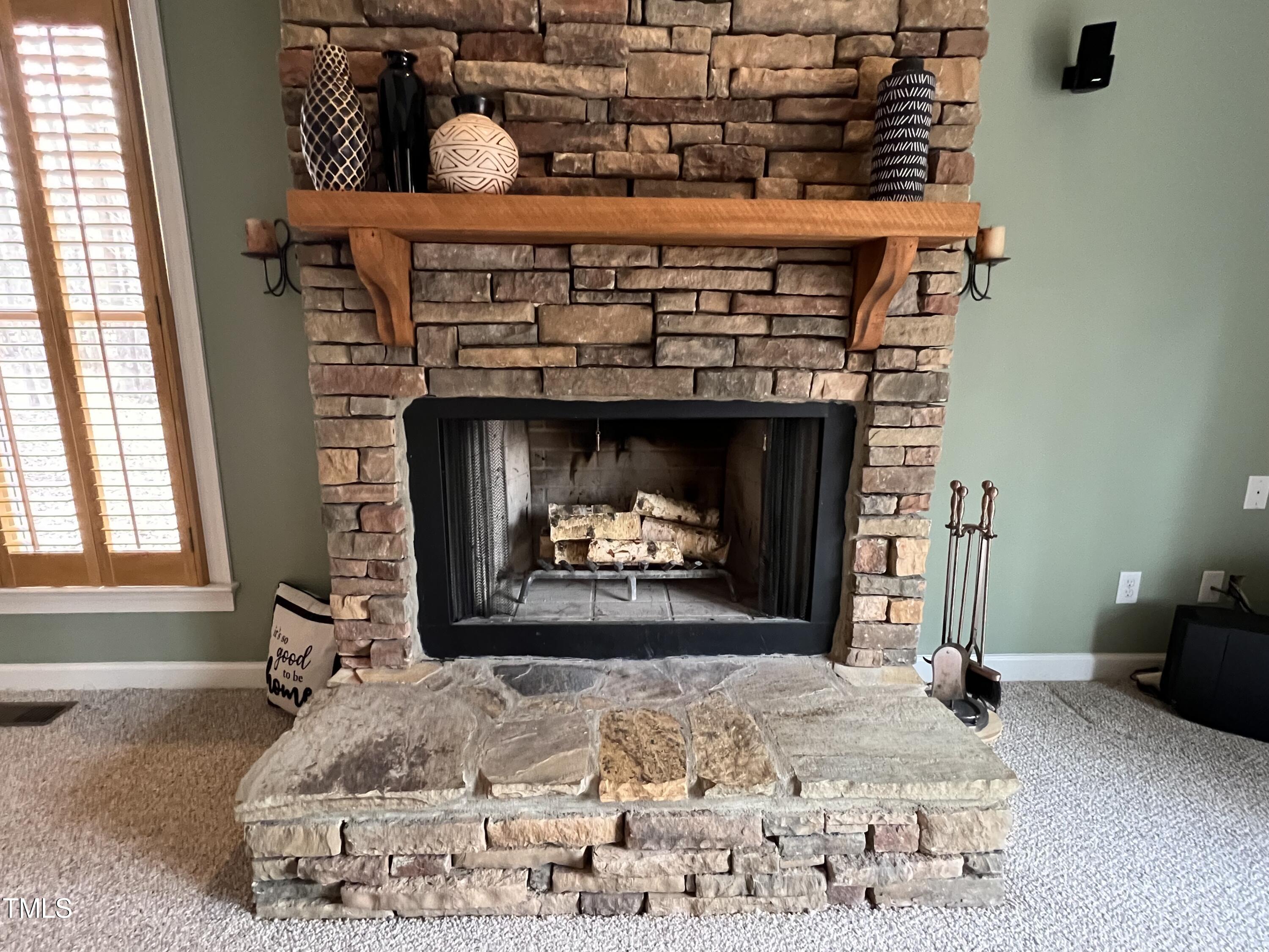 2308 Mt Vernon Church Road Raleigh, NC 27614 - Photo 9 of 59 a bed room with a bed and a fireplace