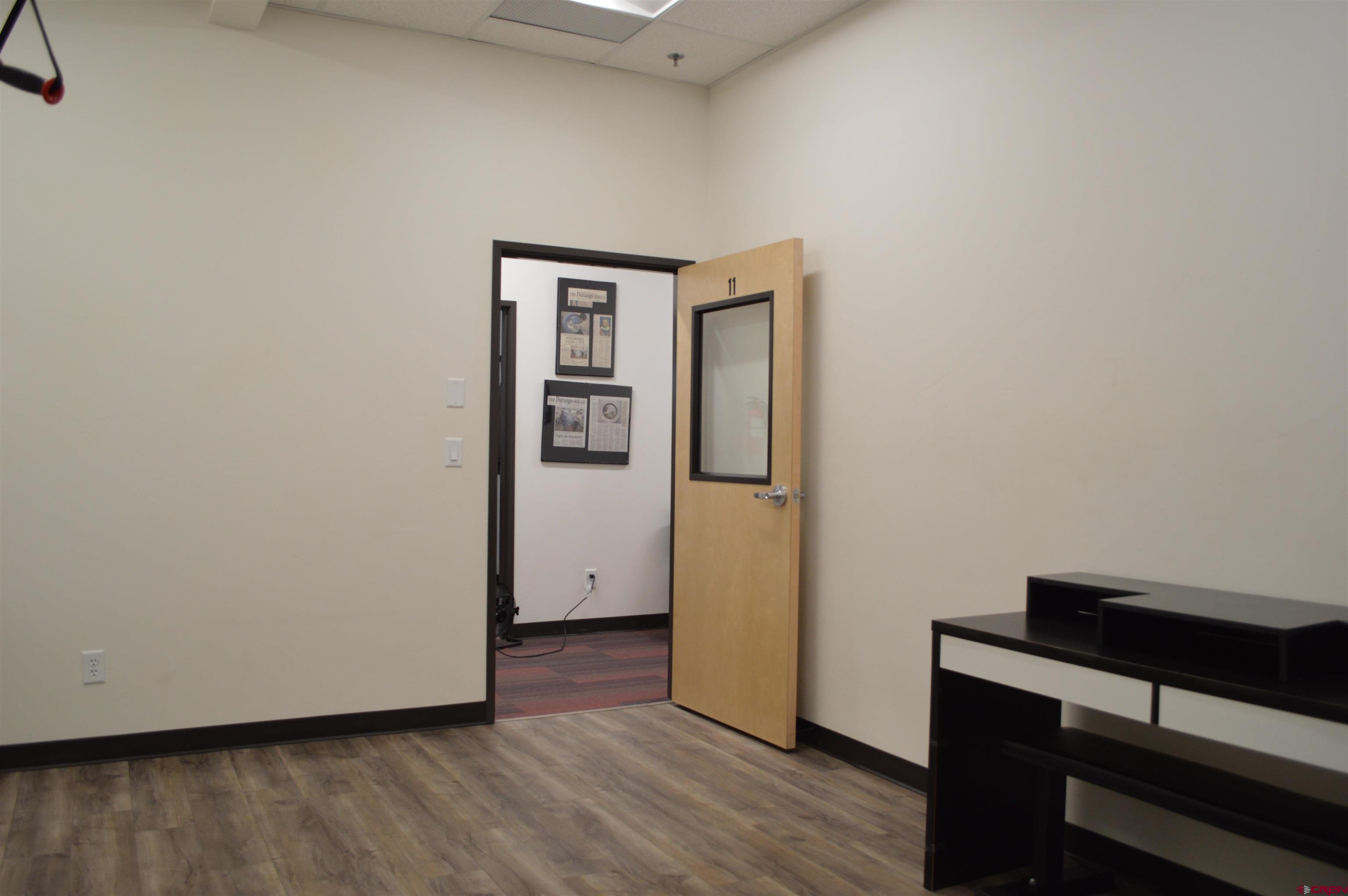 100 Jenkins Ranch Road, Unit SUITE D 11 Durango, CO 81301 - Photo 10 of 11 a view of empty room with wooden floor