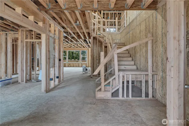 a view of a room with wooden walls