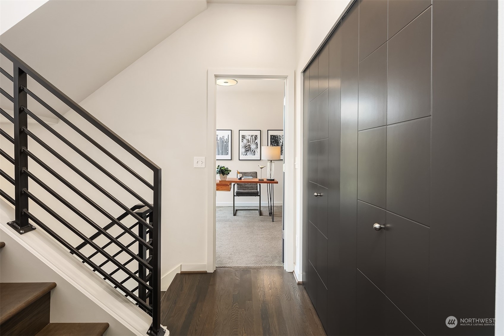 417 North 50th Street Seattle, WA 98103 - Photo 14 of 30 a view of a hallway view with wooden floor and staircase