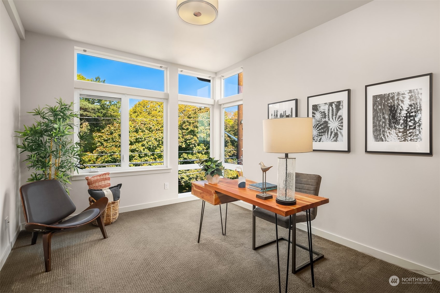 417 North 50th Street Seattle, WA 98103 - Photo 15 of 30 a reading room with furniture and a window
