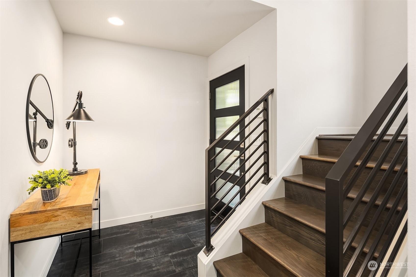 417 North 50th Street Seattle, WA 98103 - Photo 26 of 30 a view of entryway and hall with wooden floor