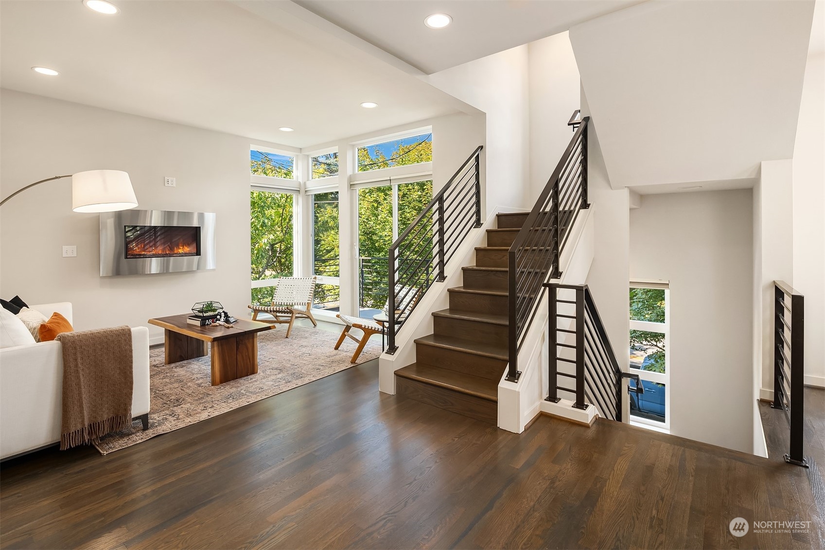 417 North 50th Street Seattle, WA 98103 - Photo 4 of 30 a living room with furniture and a wooden floor