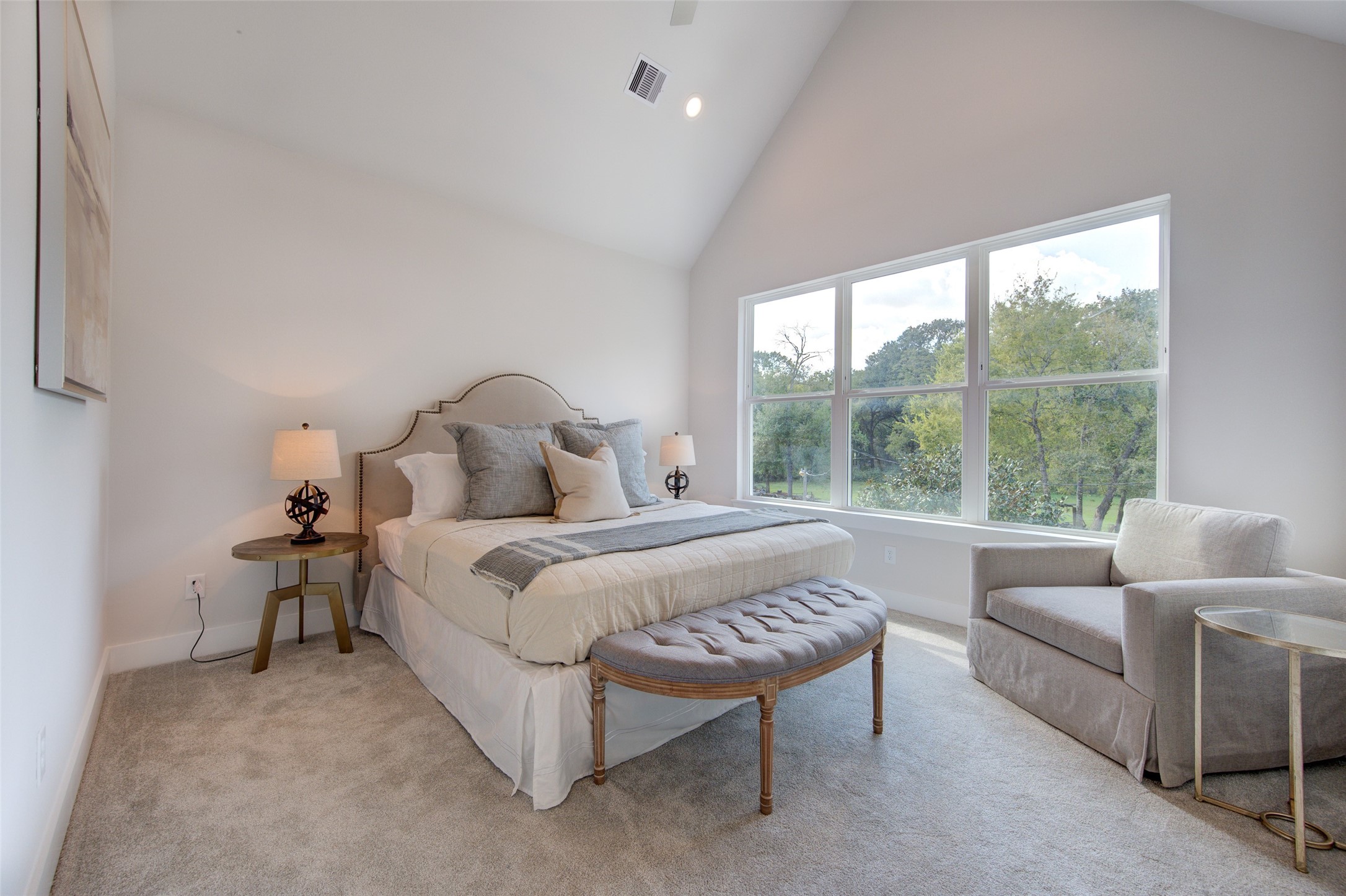 853 Mansfield Street, Unit F Houston, TX 77091 - Photo 13 of 18 a bedroom with a bed and a large window