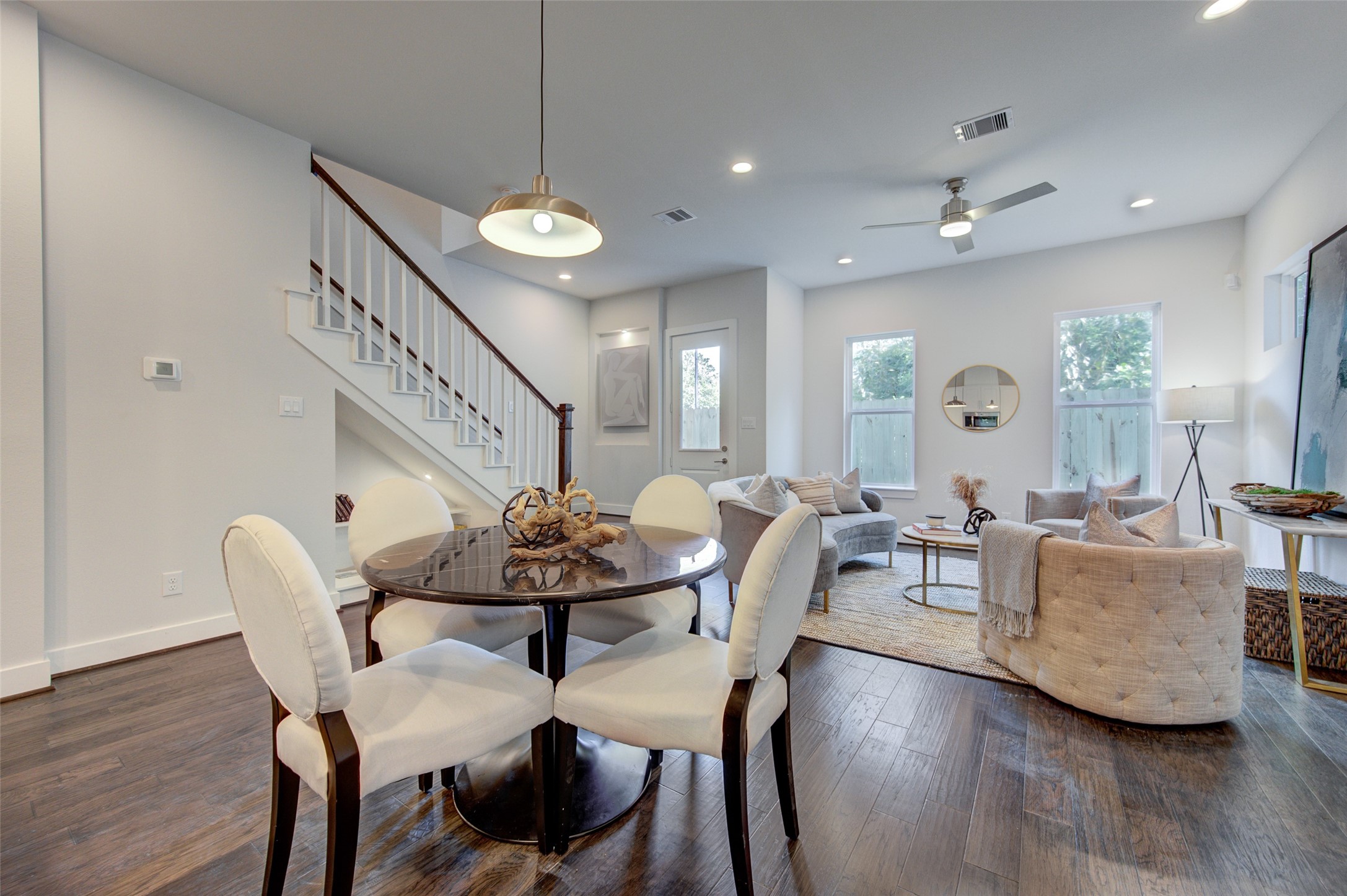 853 Mansfield Street, Unit F Houston, TX 77091 - Photo 18 of 18 a dining room with furniture and wooden floor