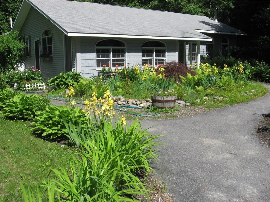 382 Ridge Road Fairfield, ME 04937 - Photo 1 of 25 Stunning landscaping welcomes you home