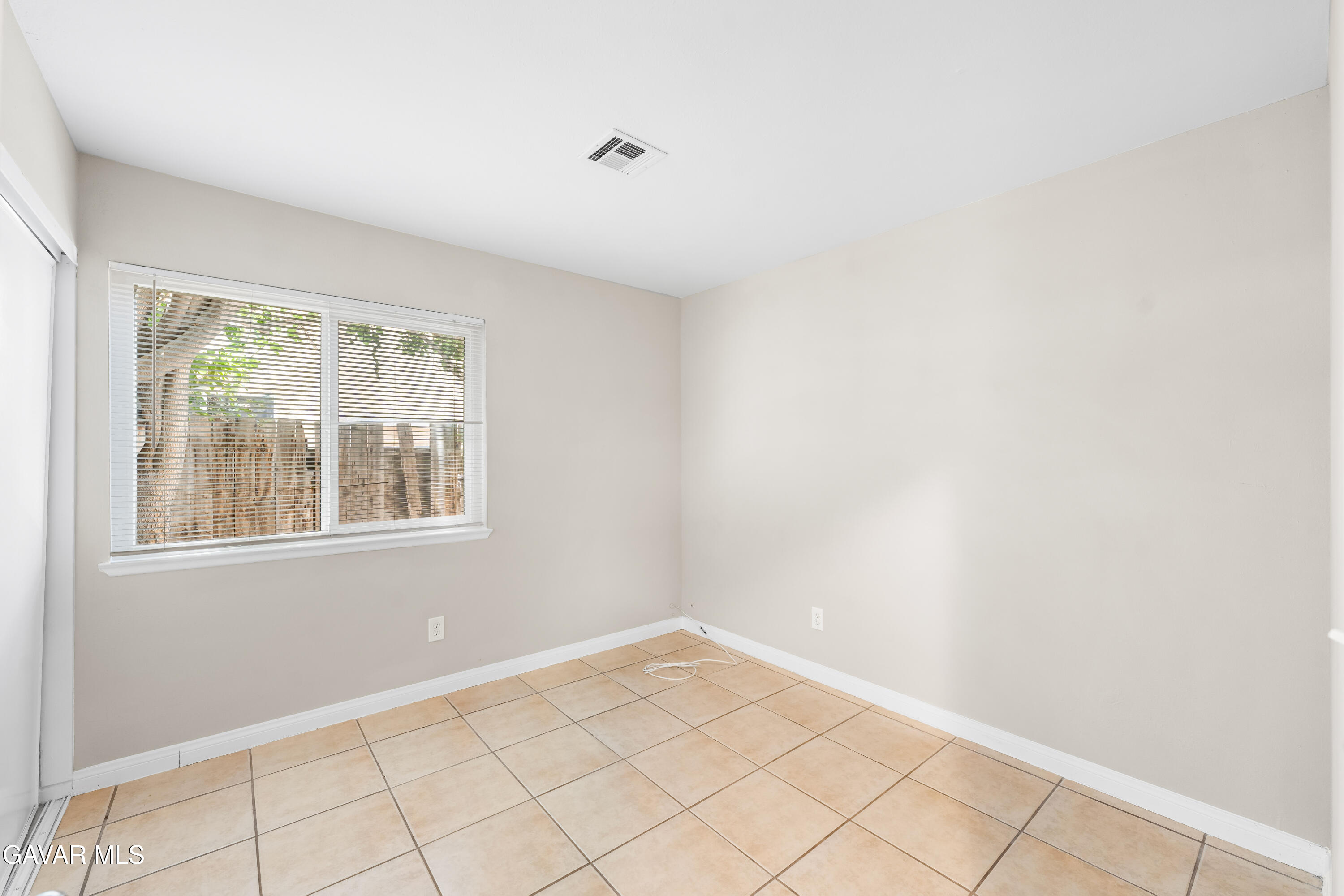39056 Dianron Road Palmdale, CA 93551 - Photo 21 of 35 an empty room with windows