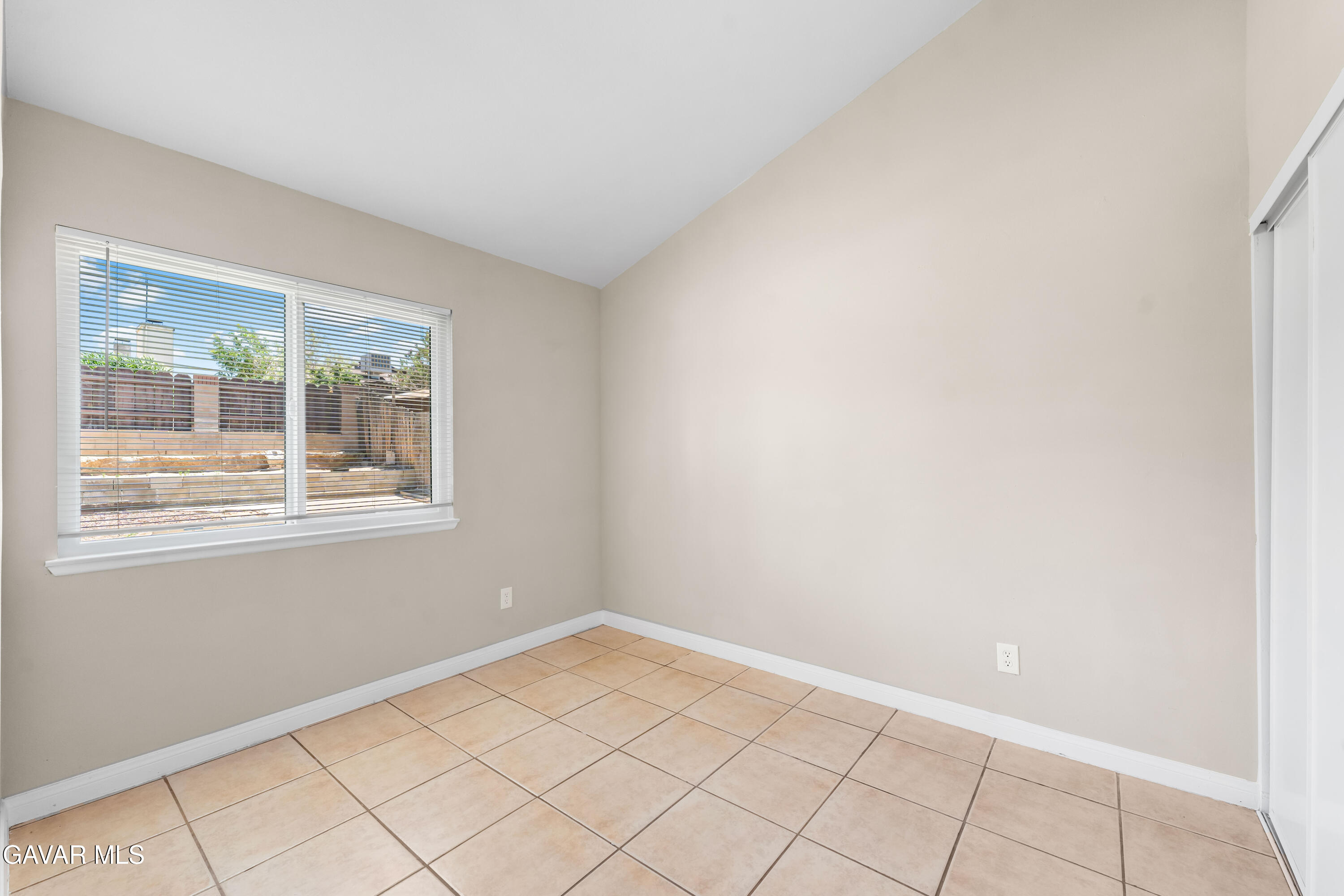 39056 Dianron Road Palmdale, CA 93551 - Photo 23 of 35 a view of an empty room with a window