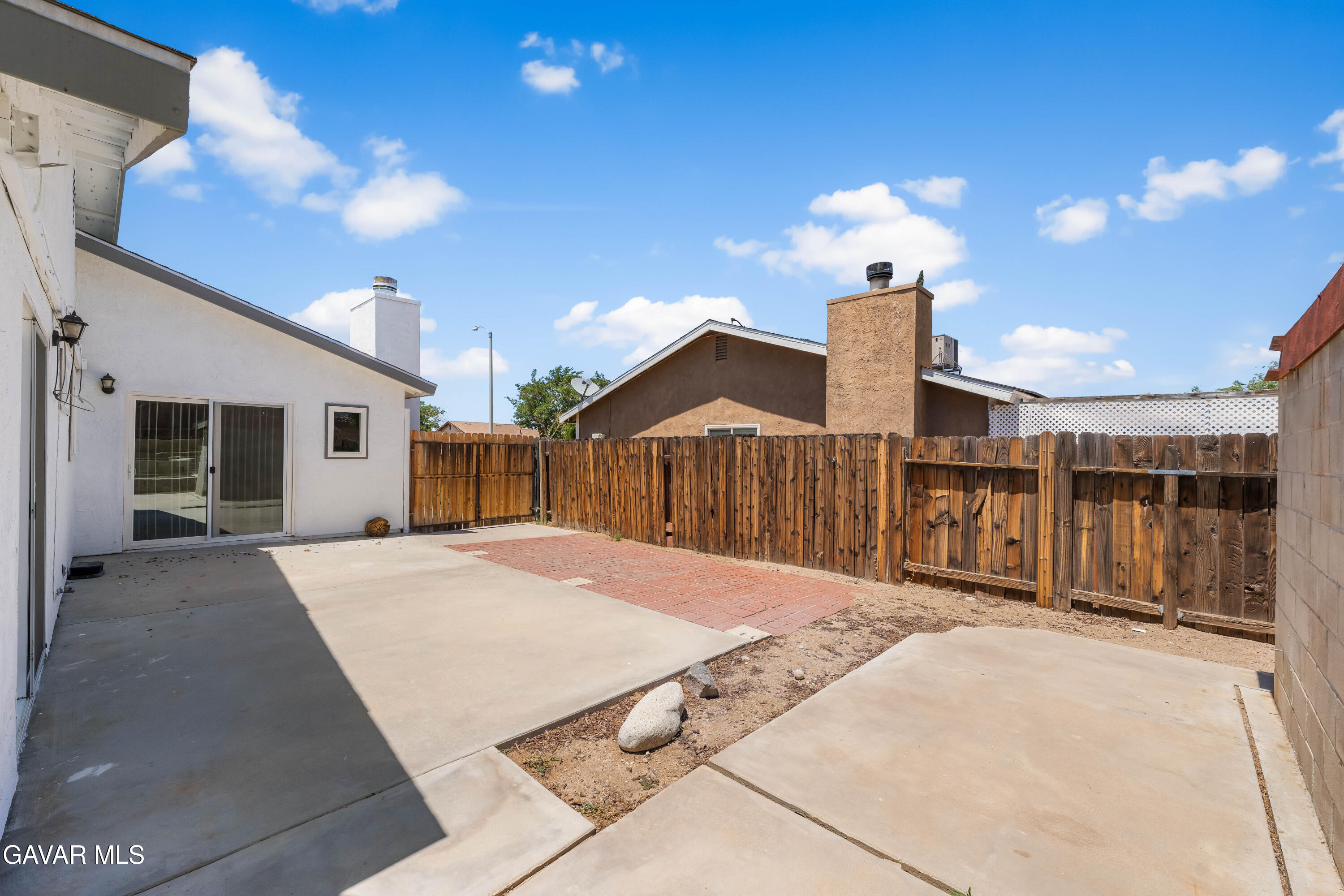 39056 Dianron Road Palmdale, CA 93551 - Photo 32 of 35 a front view of a house with a garage