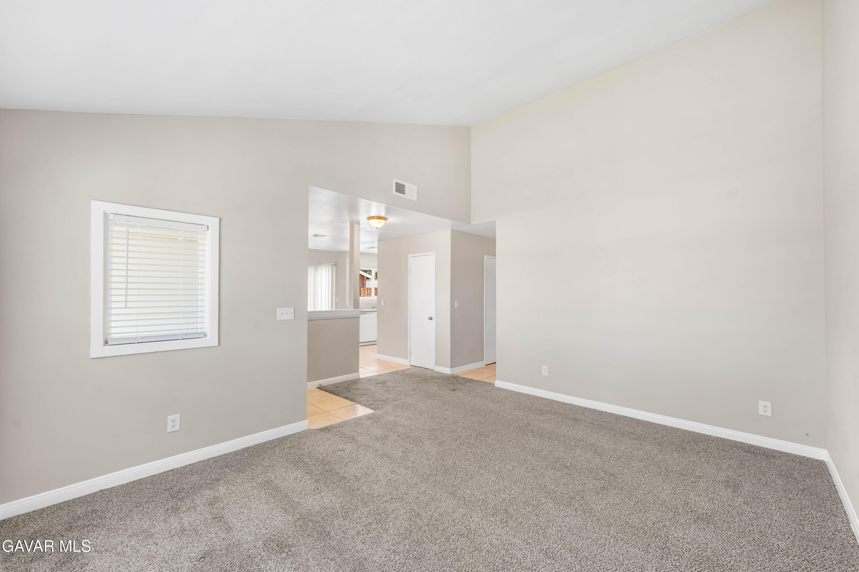 39056 Dianron Road Palmdale, CA 93551 - Photo 7 of 35 a view of an empty room with a window