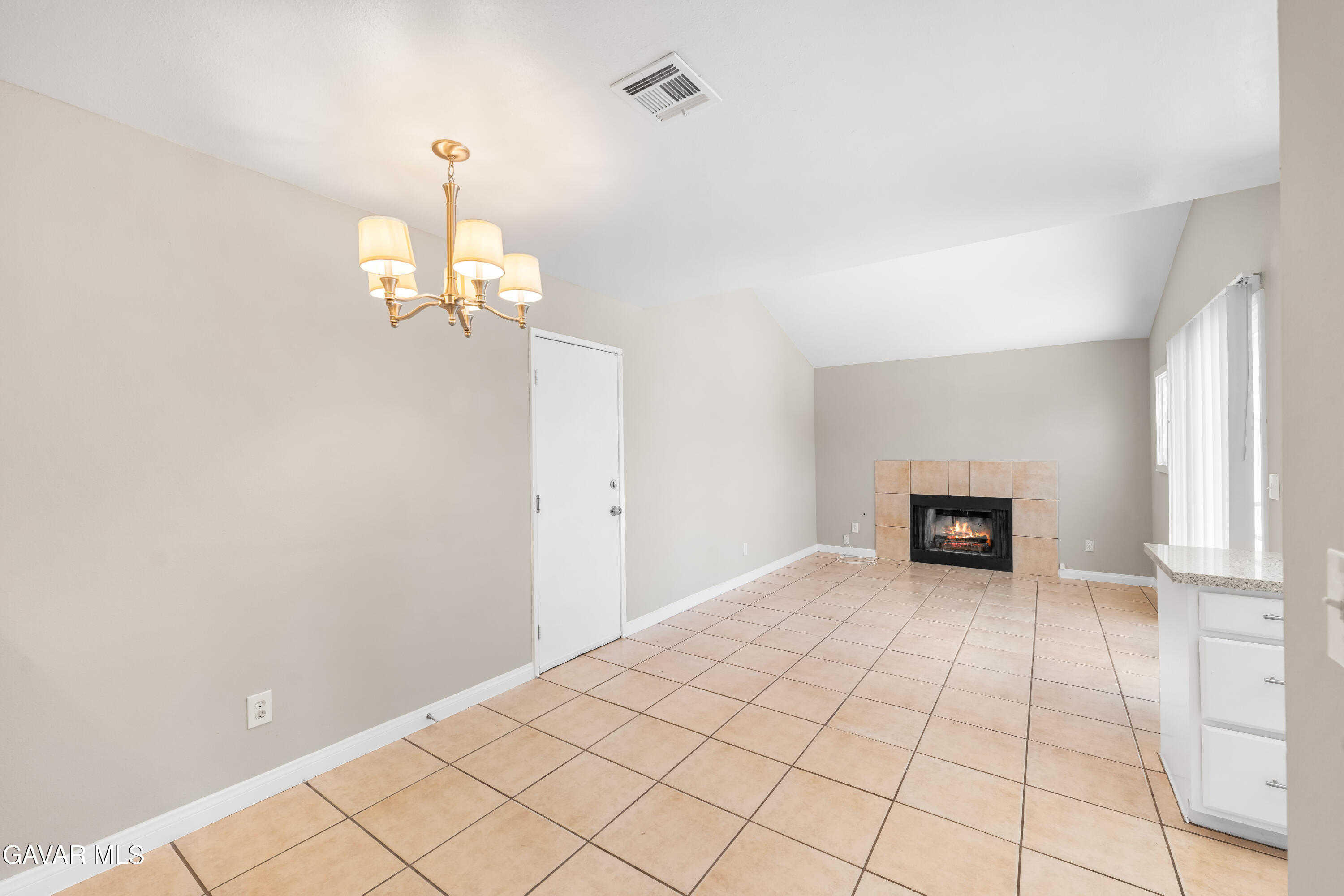 39056 Dianron Road Palmdale, CA 93551 - Photo 8 of 35 a view of an empty room with a window