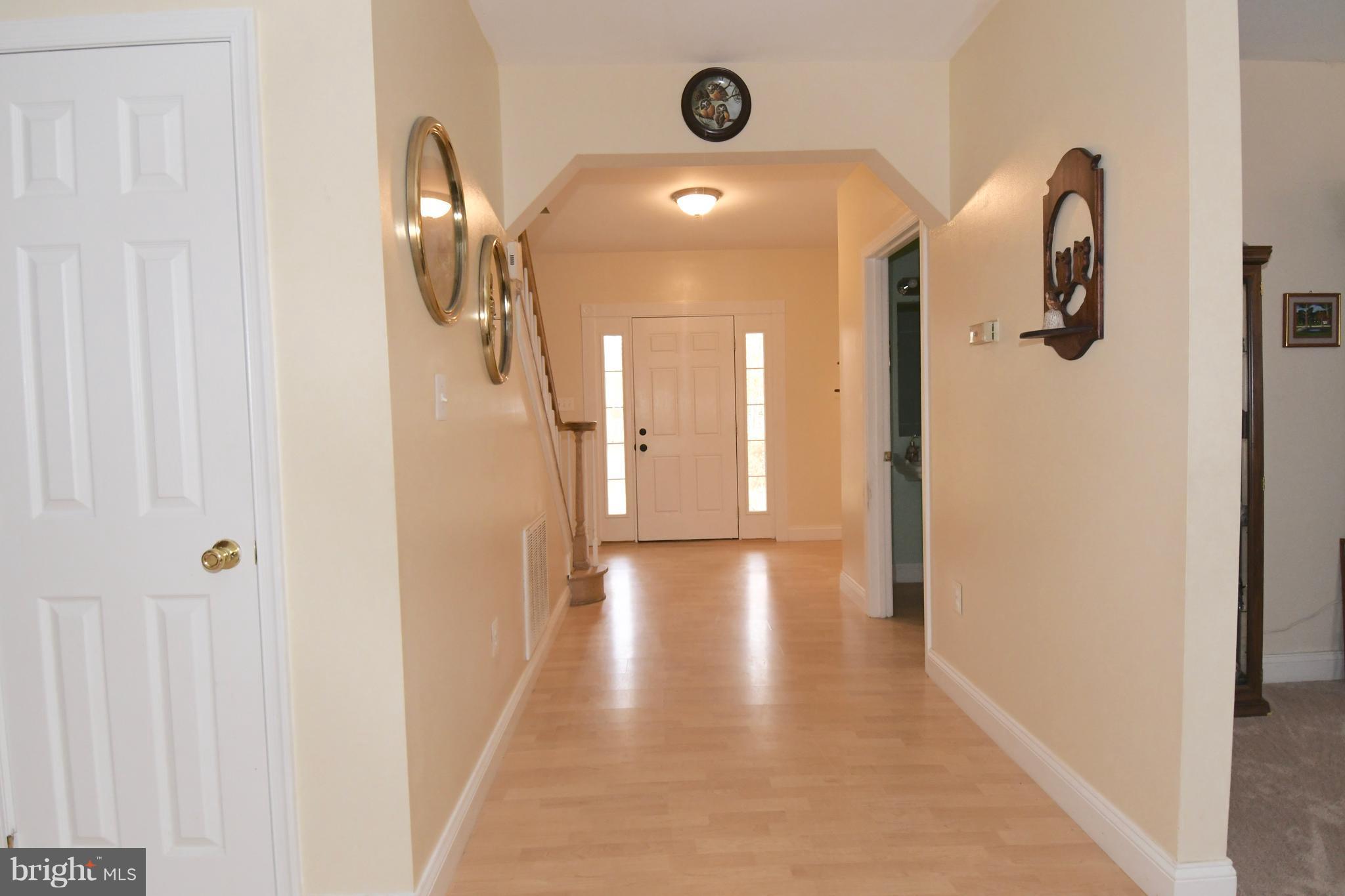 9065 Riverside Road Nanjemoy, MD 20662 - Photo 3 of 23 Foyer view from looking towards the front door.