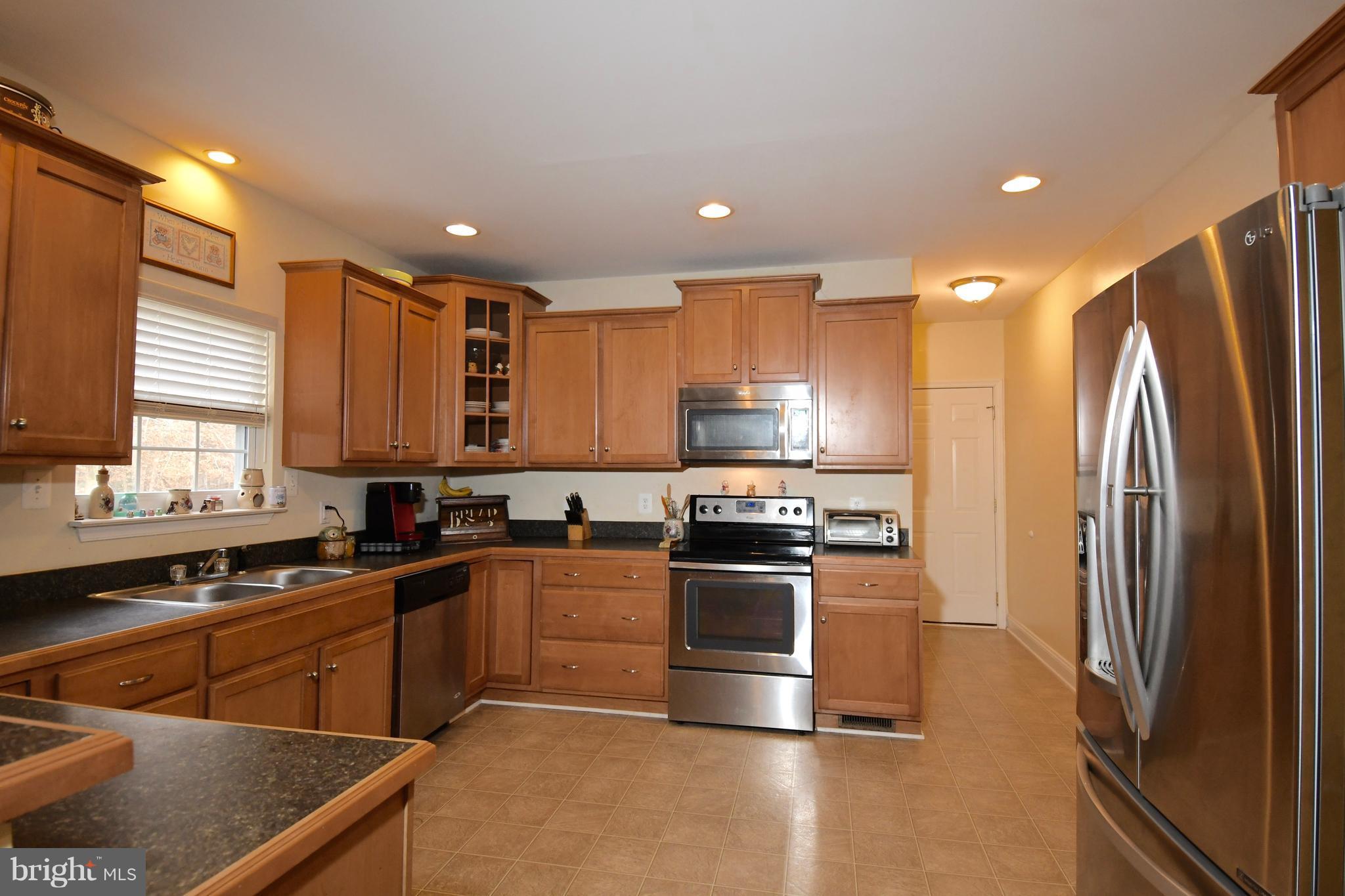 9065 Riverside Road Nanjemoy, MD 20662 - Photo 4 of 23 Beautiful kitchen with stainless steel appliances.
