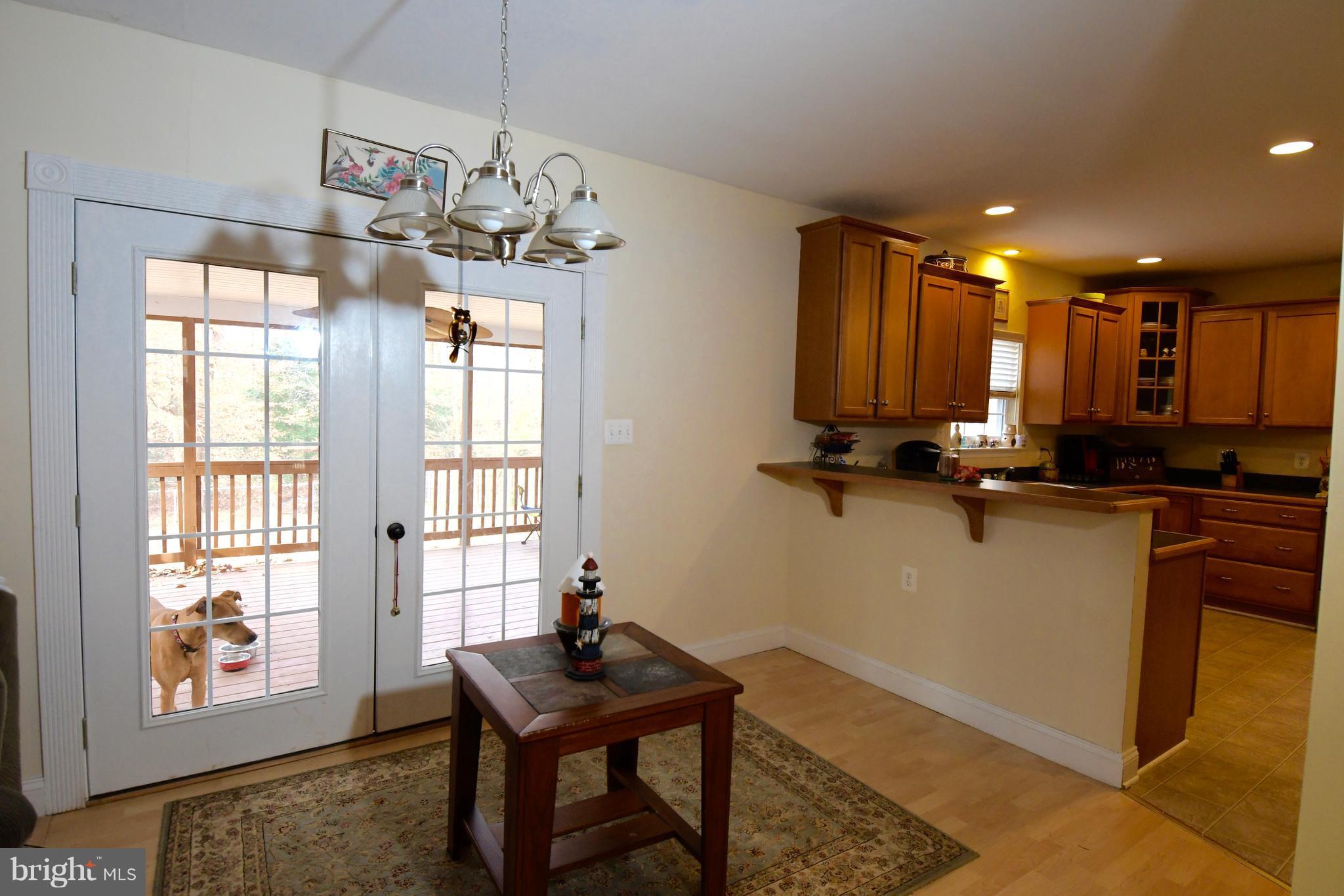 9065 Riverside Road Nanjemoy, MD 20662 - Photo 5 of 23 Breakfast room with space for tables and barstools