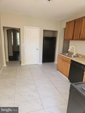 a view of a kitchen with utility and utility room