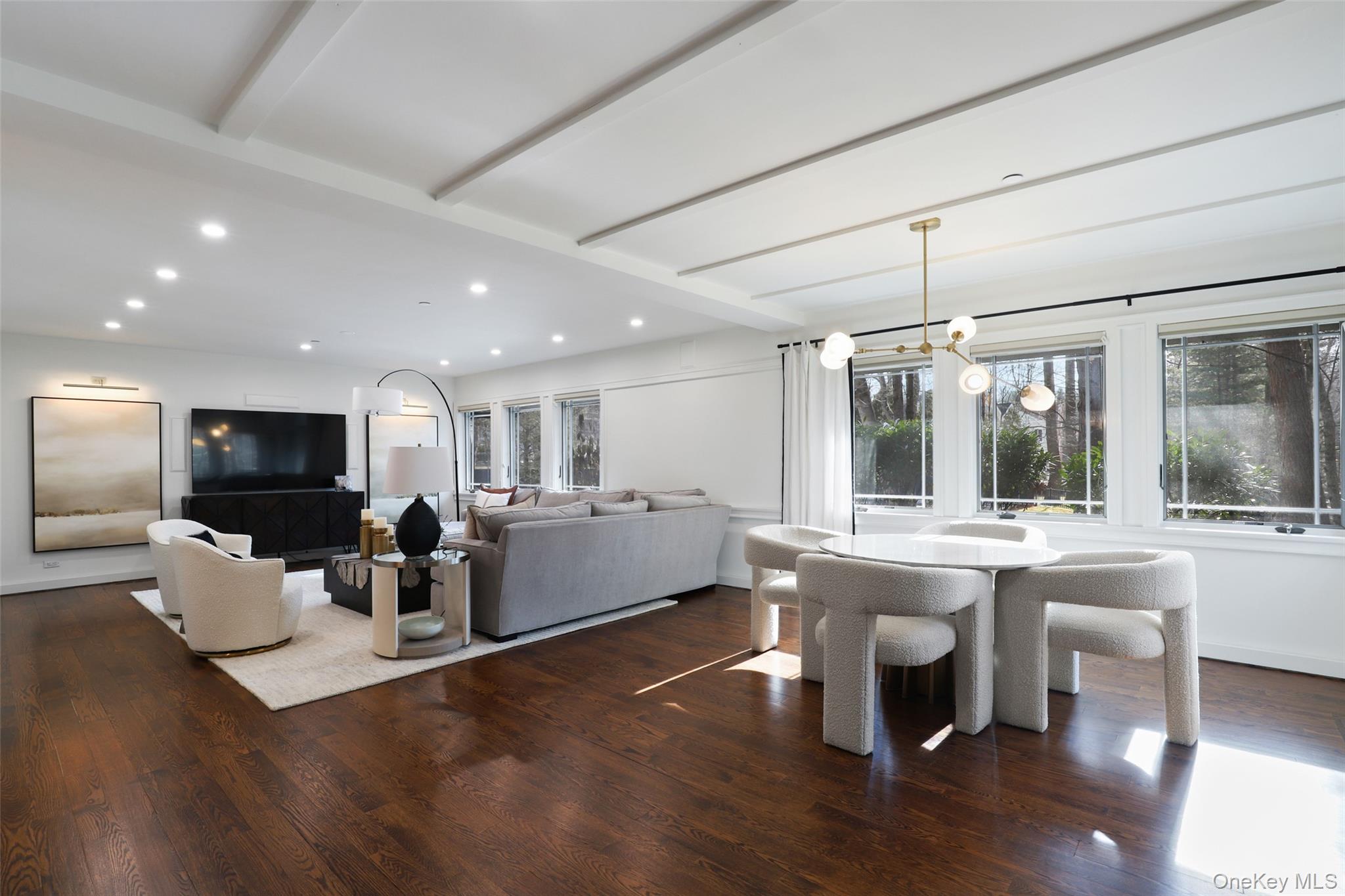 54 Lincoln Avenue Rye Brook, NY 10577 - Photo 11 of 38 a view of a dining room with furniture wooden floor and chandelier