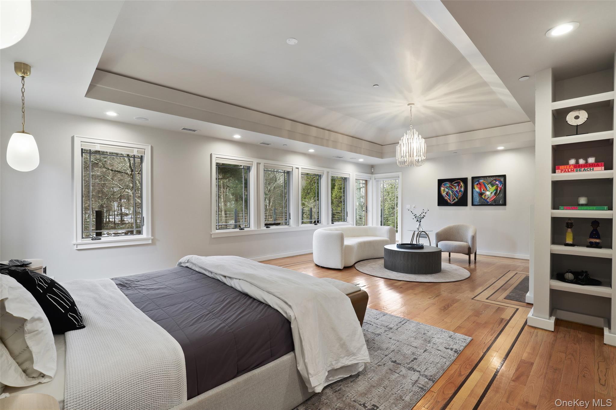 54 Lincoln Avenue Rye Brook, NY 10577 - Photo 19 of 38 a bedroom with furniture and a wooden floor