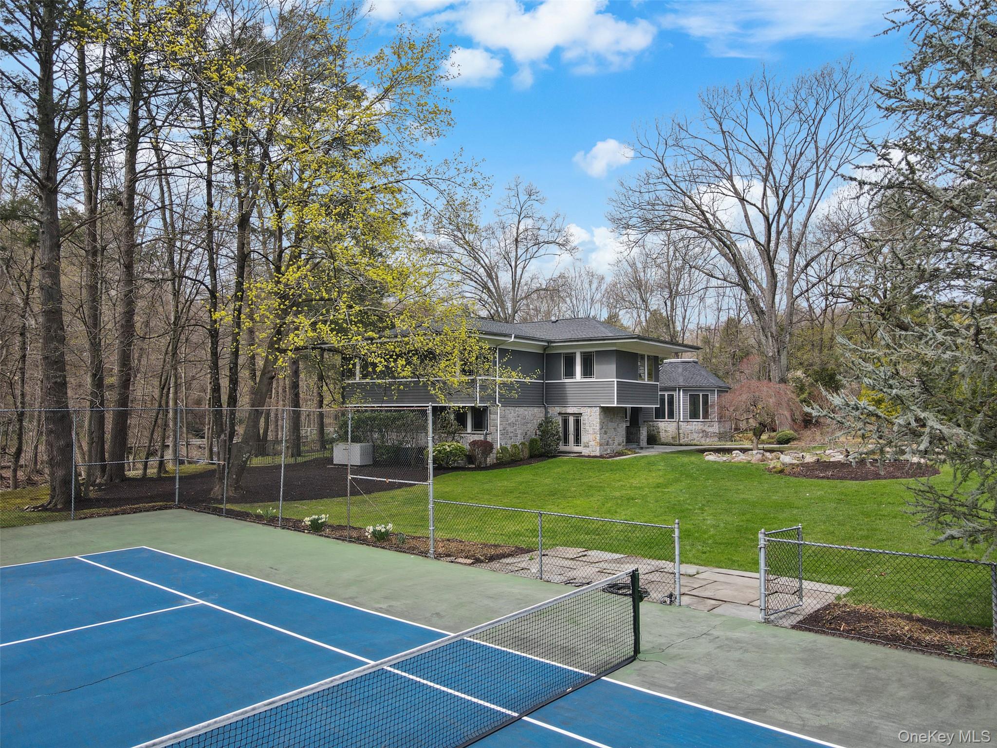 54 Lincoln Avenue Rye Brook, NY 10577 - Photo 34 of 38 a view of a house with a backyard