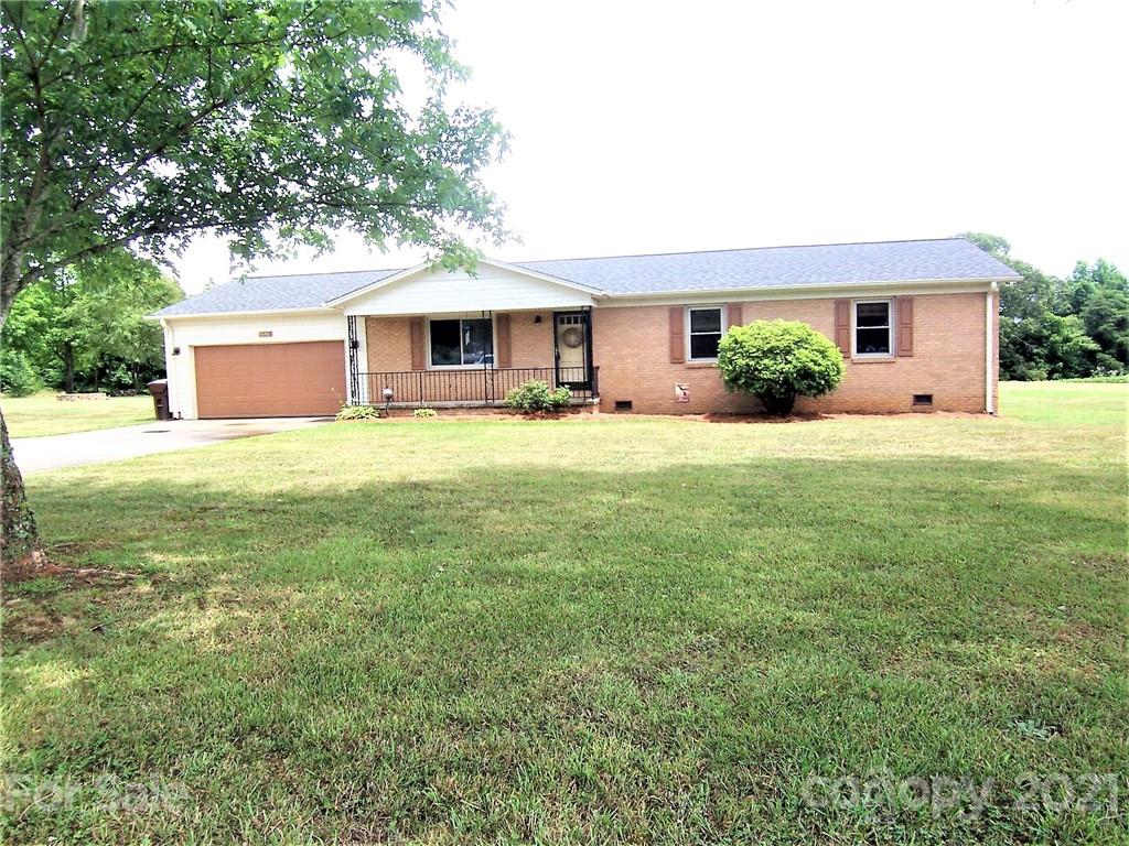 3536 Fallston Road Shelby, NC 28150 - Photo 1 of 34 a front view of house with yard and trees