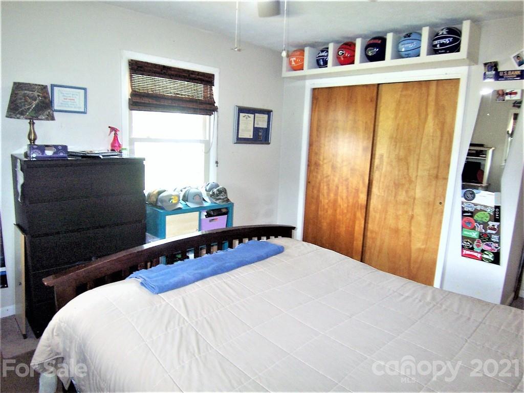 3536 Fallston Road Shelby, NC 28150 - Photo 25 of 34 a bedroom with a bed and a window