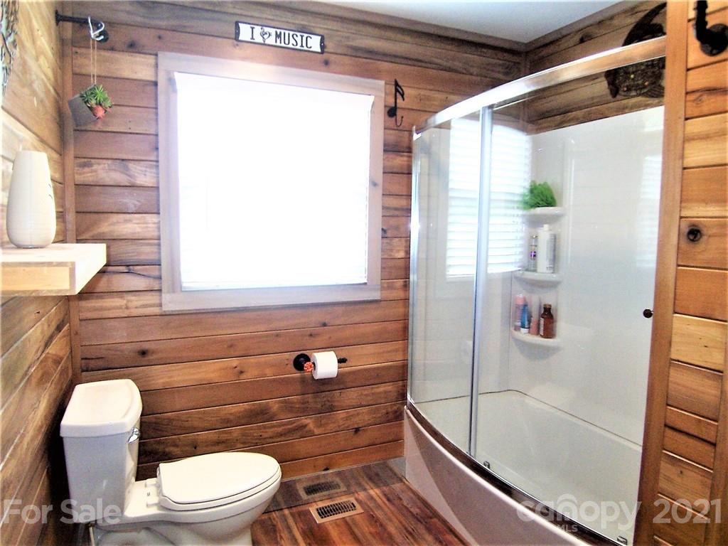 3536 Fallston Road Shelby, NC 28150 - Photo 29 of 34 a bathroom with a toilet and a shower