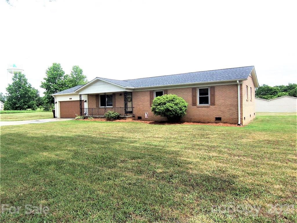 3536 Fallston Road Shelby, NC 28150 - Photo 4 of 34 a front view of house with yard and outdoor seating