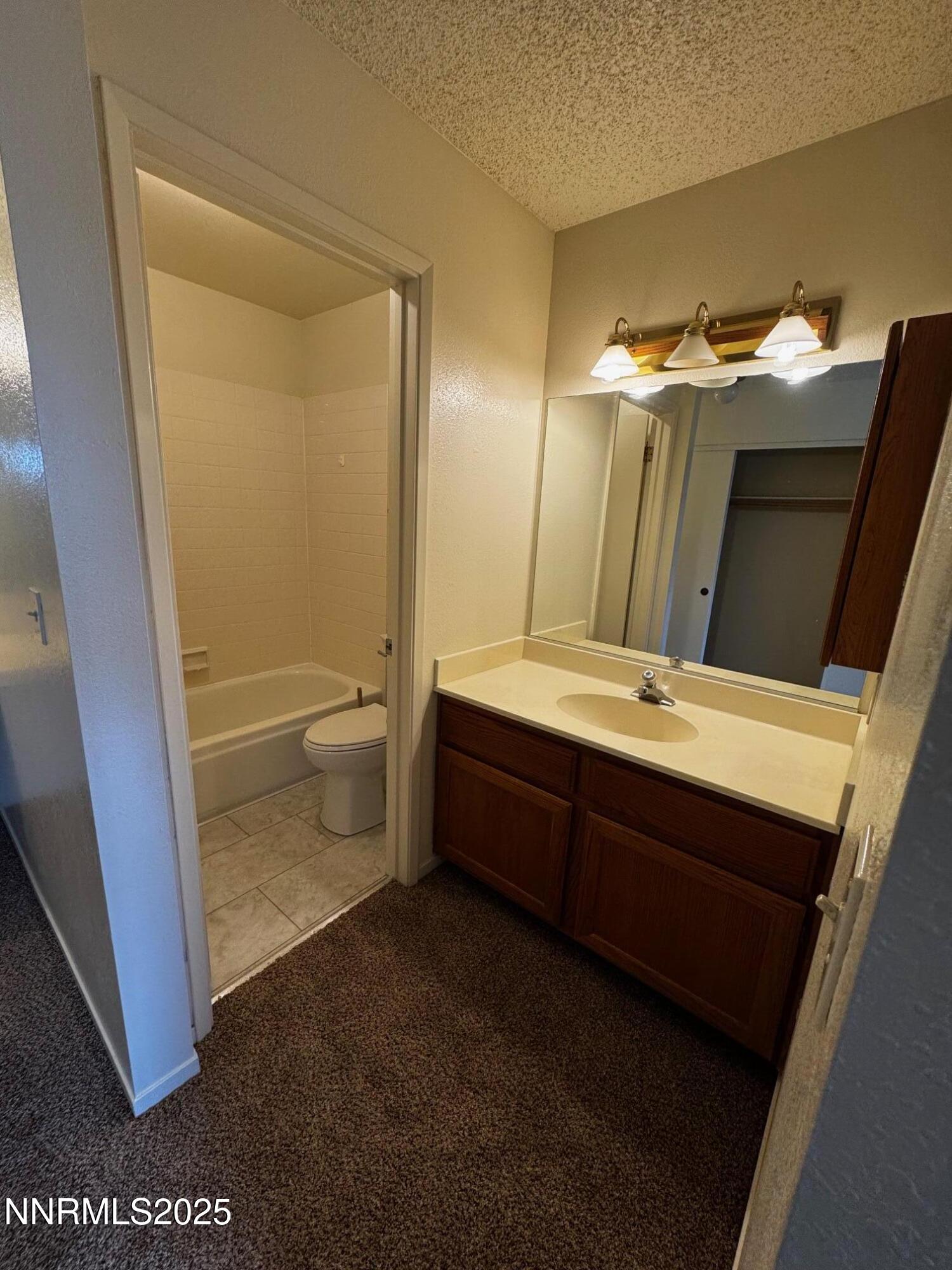 3967 Kings Row Reno, NV 89503 - Photo 13 of 21 a bathroom with a double vanity sink toilet and shower