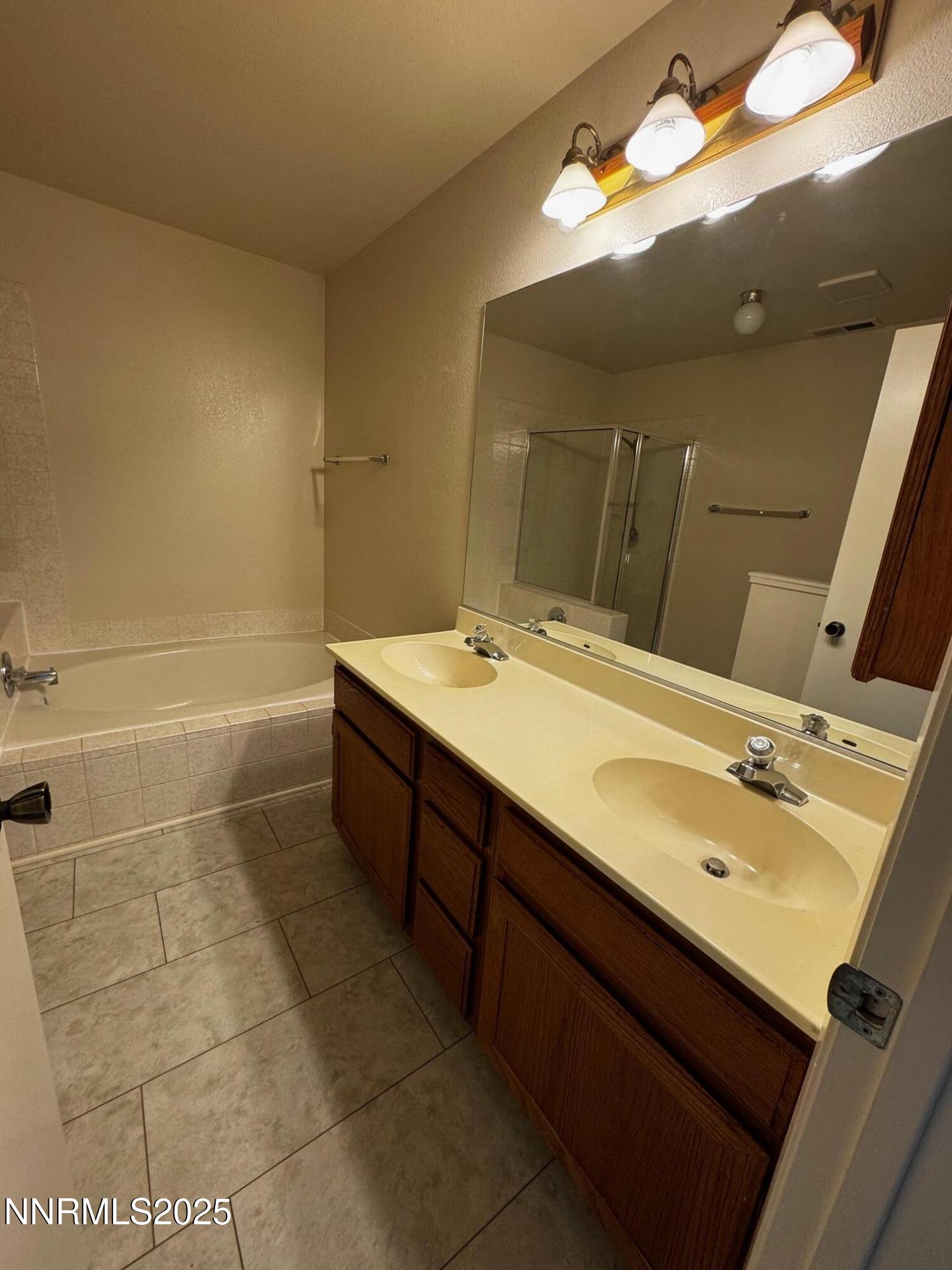 3967 Kings Row Reno, NV 89503 - Photo 18 of 21 a bathroom with a sink mirror and vanity