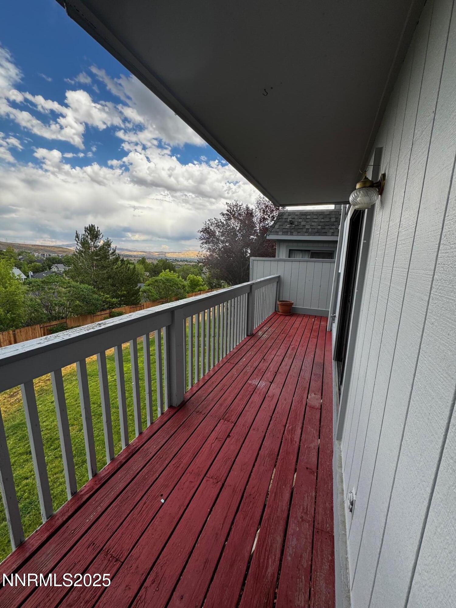3967 Kings Row Reno, NV 89503 - Photo 4 of 21 a view of deck with wooden floor and fence