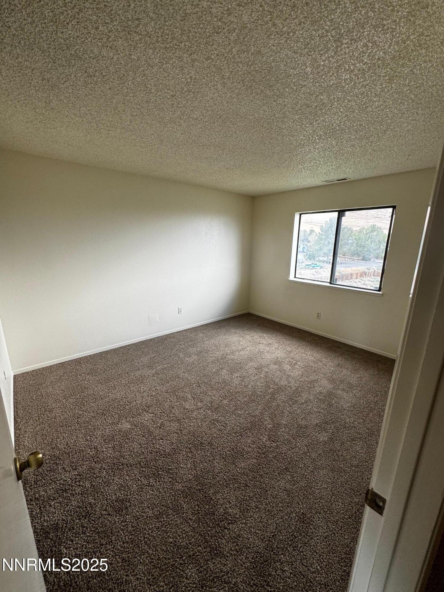 3967 Kings Row Reno, NV 89503 - Photo 10 of 21 an empty room with windows