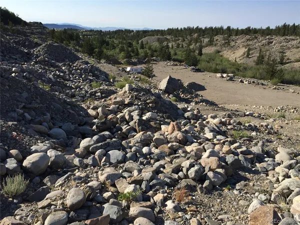 a view of a town with trees