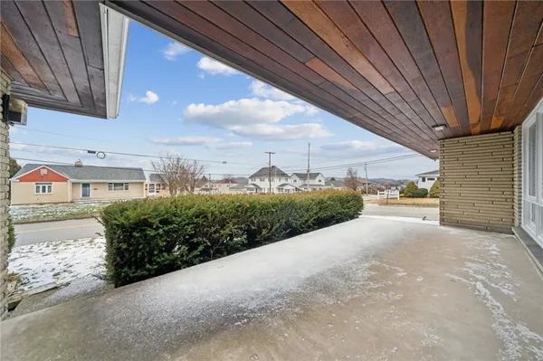 a view of a back yard of the house