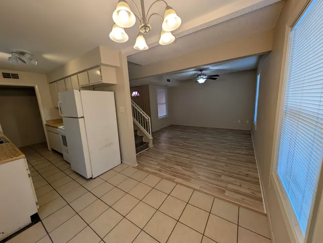 a view of a storage & utility room with a washer dryer