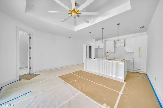 a spacious bathroom with a tub and a shower