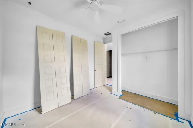 an empty room with closet