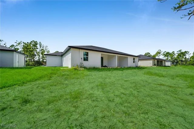 a house view with a garden space