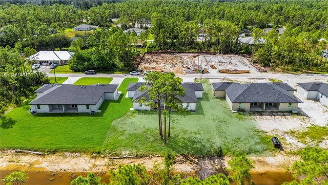 a balcony with table and chairs