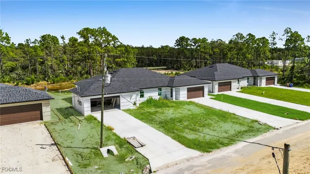 a house view with a garden space
