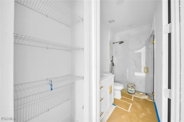 a bathroom with a tub and shower