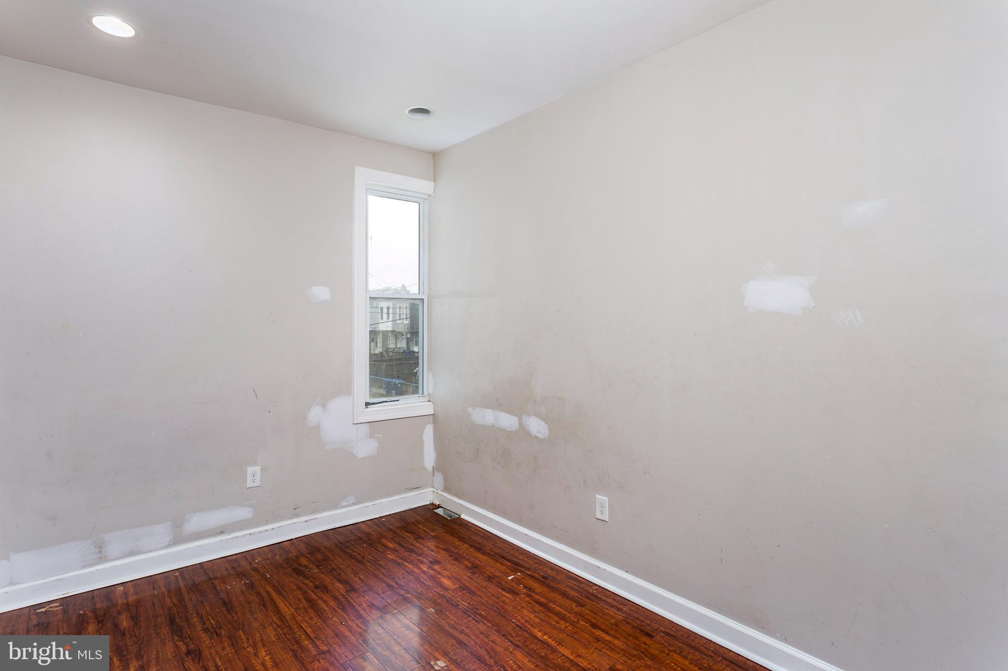 2706 Greenmount Avenue Baltimore, MD 21218 - Photo 12 of 22 Middle Bedroom