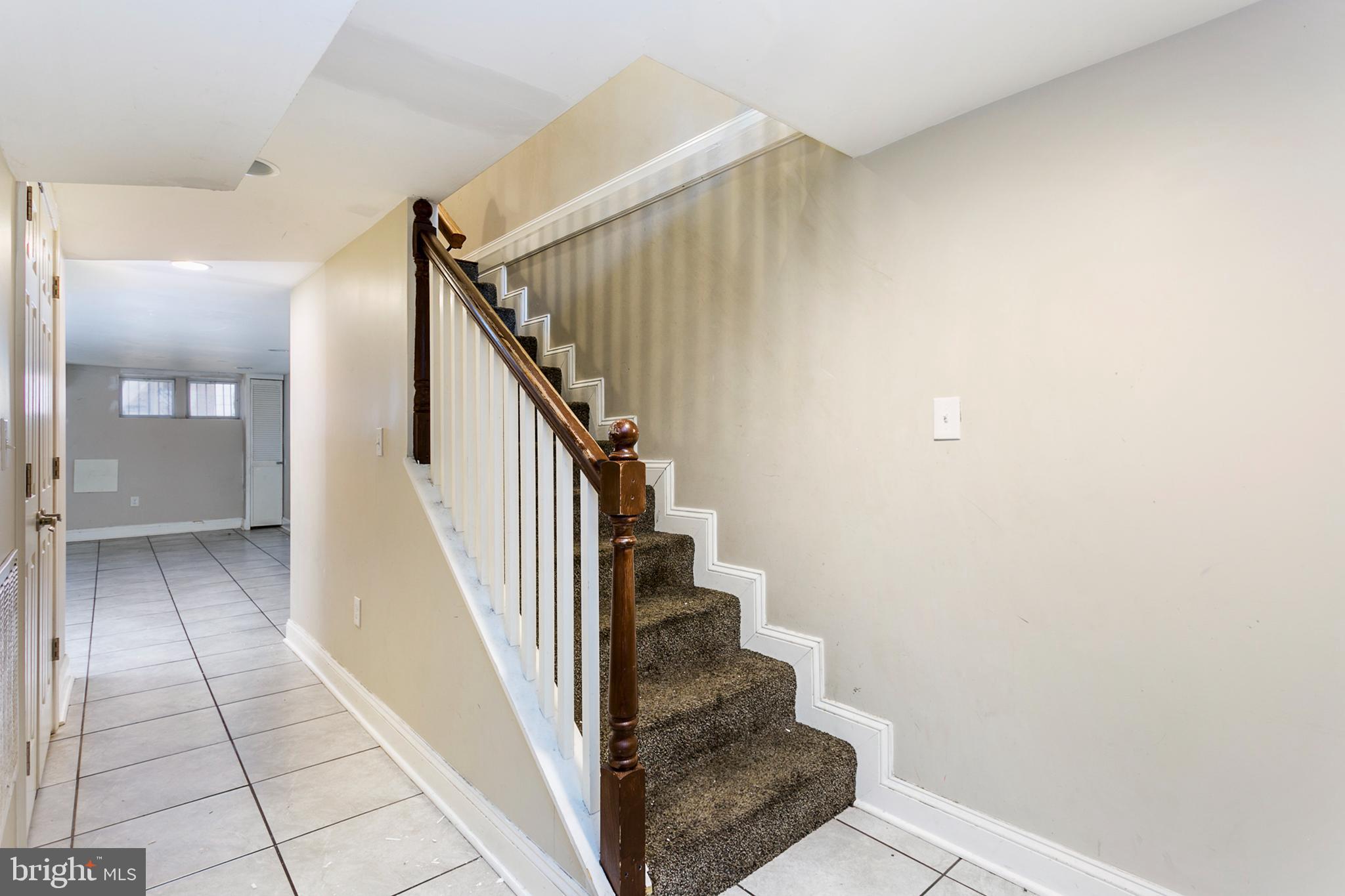 2706 Greenmount Avenue Baltimore, MD 21218 - Photo 14 of 22 Staircase to the basement level
