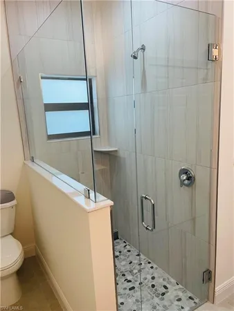 a kitchen with sink and cabinets