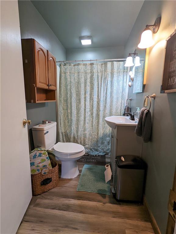 1112 New Castle Road Prospect, PA 16052 - Photo 11 of 25 a bathroom with a toilet and a mirror