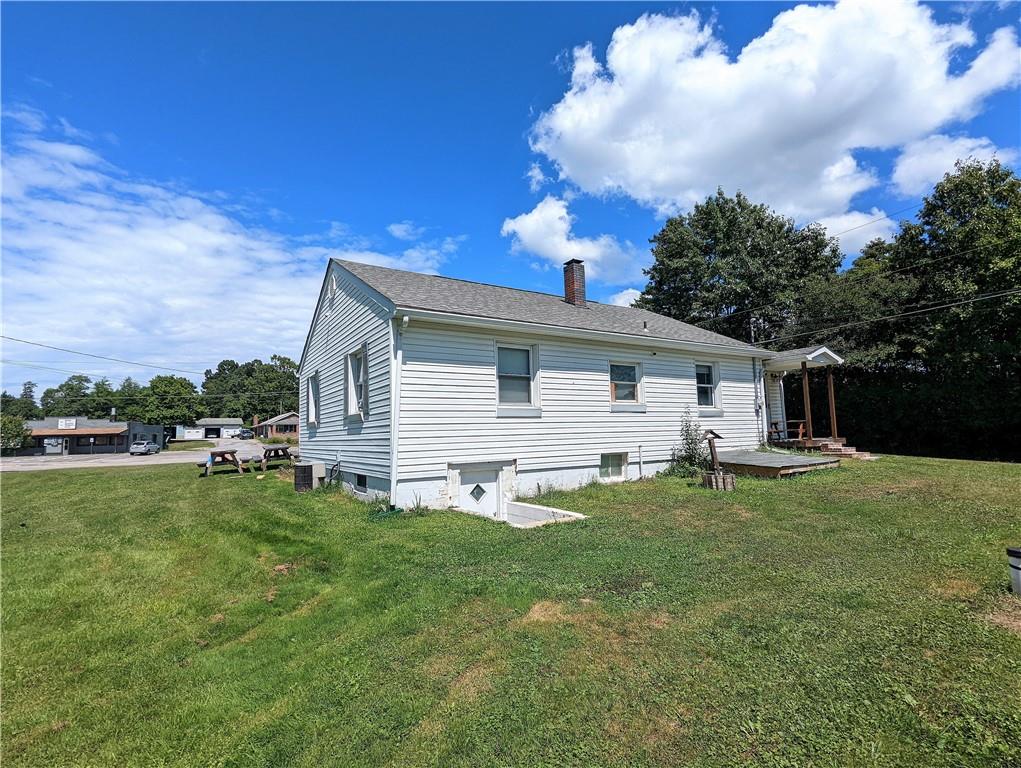 1112 New Castle Road Prospect, PA 16052 - Photo 17 of 25 a view of a house with backyard