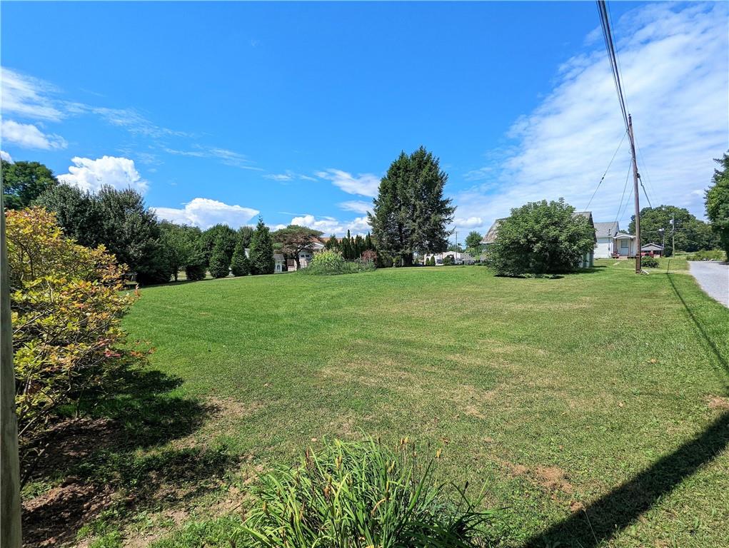 1112 New Castle Road Prospect, PA 16052 - Photo 20 of 25 a view of a big yard with large trees
