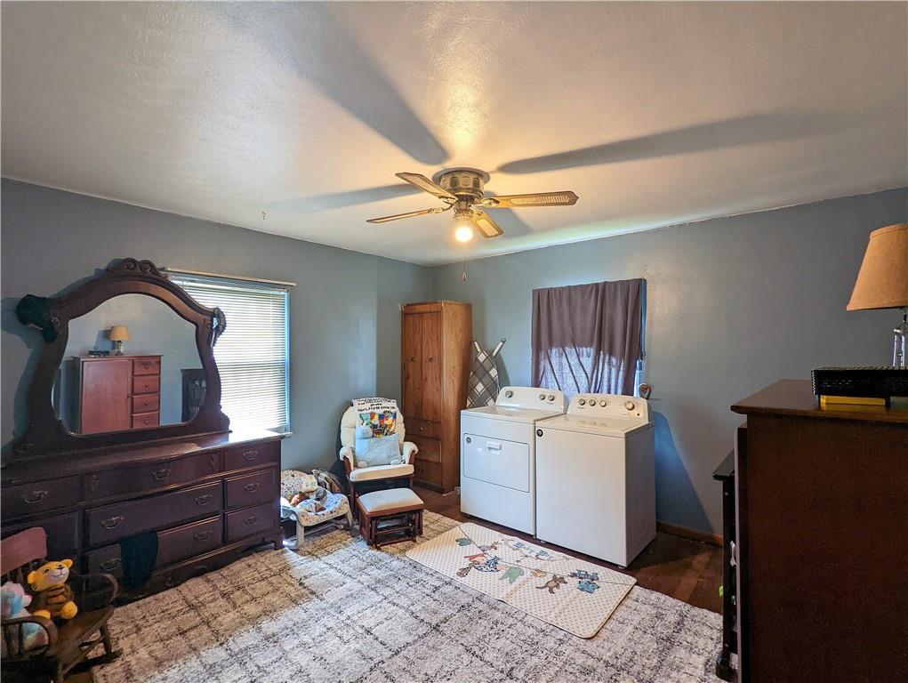 1112 New Castle Road Prospect, PA 16052 - Photo 7 of 25 a living room with furniture and a dresser with wooden floor