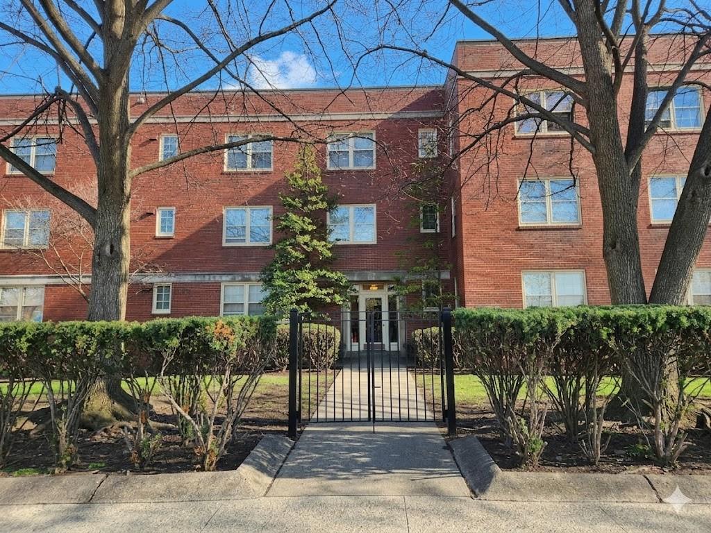 415 Bigham Street, Unit 23 Pittsburgh, PA 15211 - Photo 1 of 24 a front view of a building with tree s