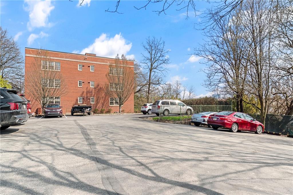 415 Bigham Street, Unit 23 Pittsburgh, PA 15211 - Photo 2 of 24 a view of street with parked cars