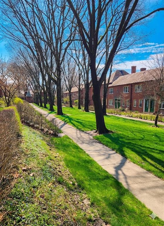 415 Bigham Street, Unit 23 Pittsburgh, PA 15211 - Photo 23 of 24 a view of a big yard next to a house